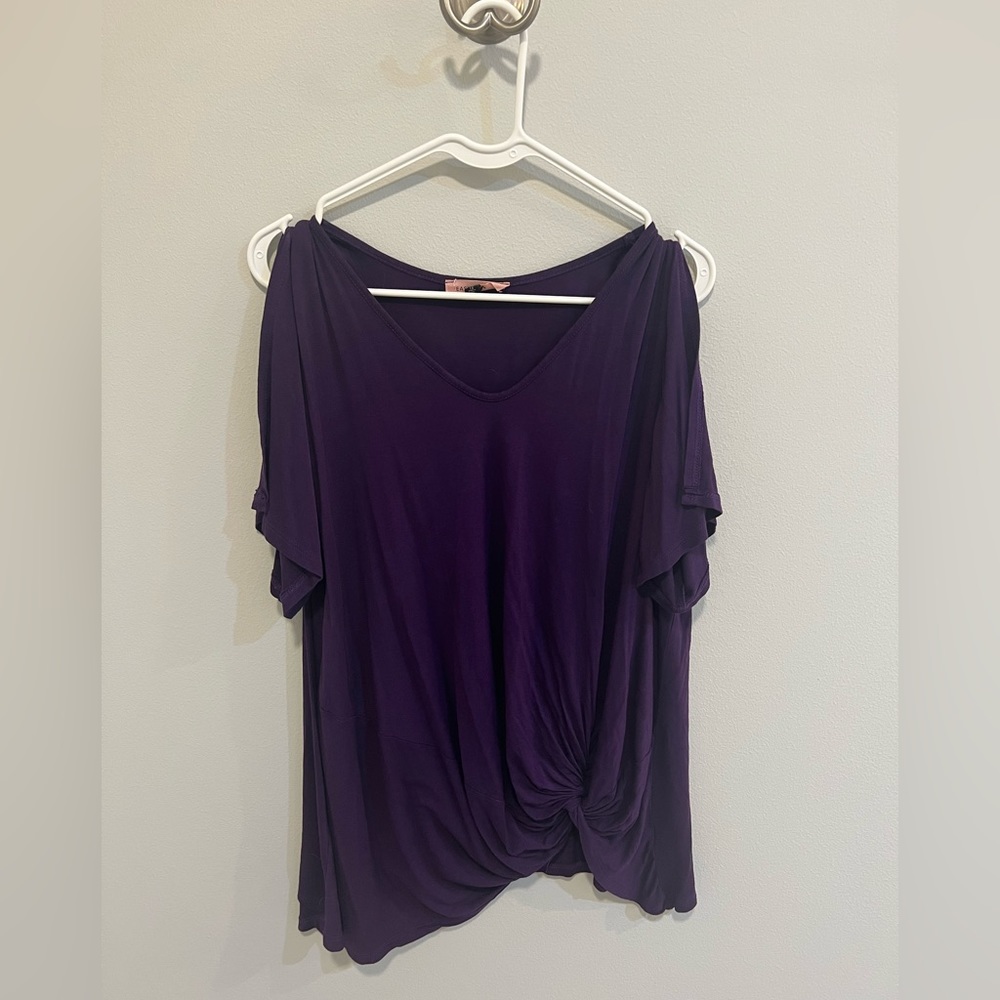 Purple cotton shirt with open flowy sleeves and runched knot at bottom left. 1X